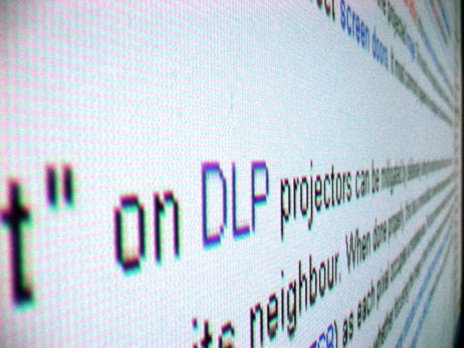 A close-up shot of a monitor, showing the grid of the